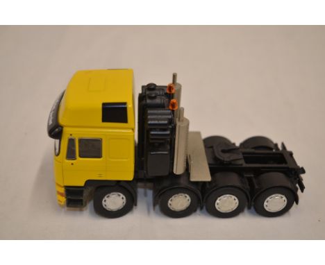 2 1/50 scale diecast models by Conrad:A Mercedes-Benz Actros truck and 3-axle trailer model in Schmidbauer company colours (m