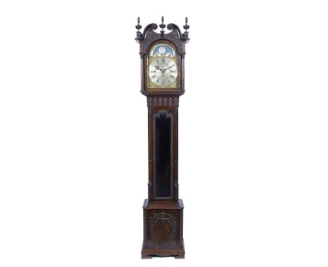 A Chippendale style mahogany grandmother clock the brass break arch dial with silvered Roman chapter ring, Arabic five minute