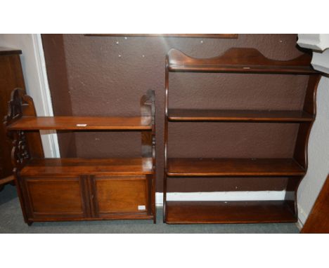 A Victorian walnut hanging wall cupboard 59cm across, together with a mahogany four tiered wall shelf, 65cm across and a maho