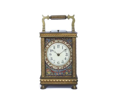 A French carriage clock the Gothic enamel dial with moon hands and polychrome floral champlevé mask, coiled gong strike and p