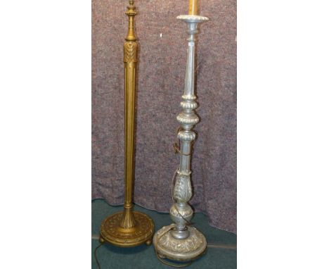 A silver coloured carved wood standard lamp and a giltwood standard lamp (2)