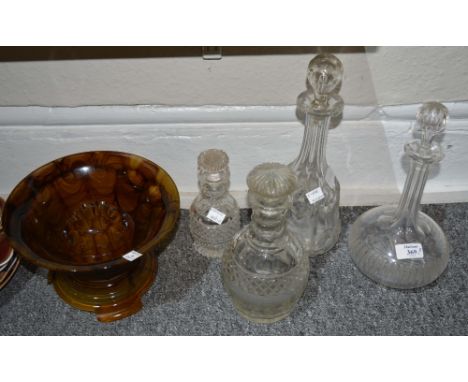 A 19th Century cut-glass decanter 24cm and three Victorian decanters and an opaline rose bowl