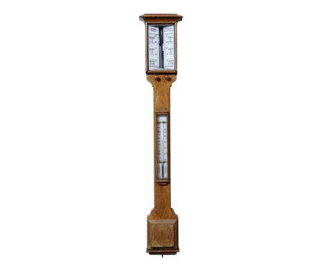 A Victorian golden oak stick barometer the twin angled glass vernier scales signed Hawes, 79 Leadenhall St., London, the trun