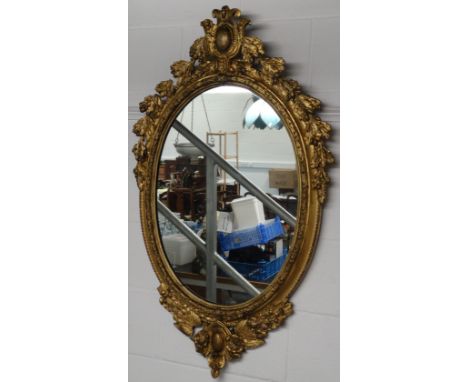 GILT FRAMED OVAL MIRROR 