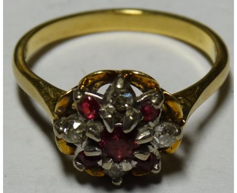 18CT GOLD DIAMOND & RUBY CLUSTER RING 