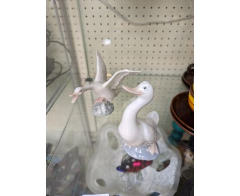Lladro Goose and a Nao Goose 