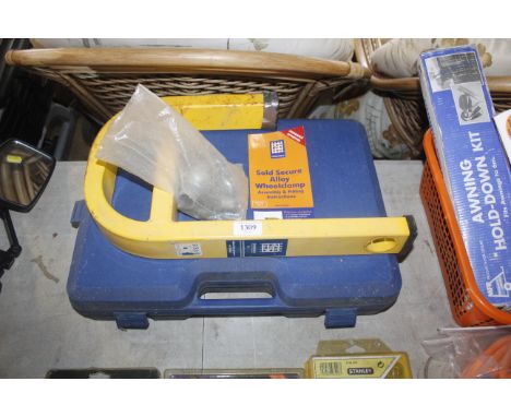 An alloy wheel clamp in fitted box