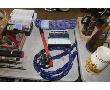 A steering wheel lock with keys, set of small ratchet straps, as new multi ply rope and a large motorbike chain