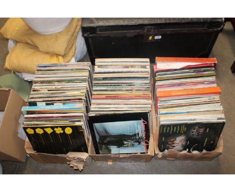 Three boxes containing various records to include Fleetwood Mac, John Lennon, Star Wars, Michael Jackson, Elton John, etc.