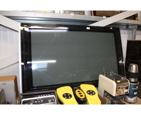 A Panasonic flat screen television lacking power lead