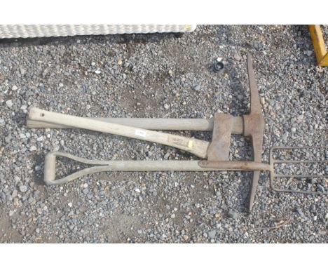 A pick axe and a four prong fork