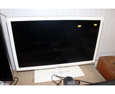 A Samsung  32" flat screen television with remote control 