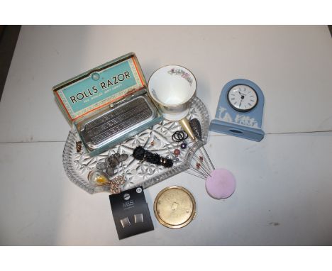A glass dressing table tray, hat pins, Rolls razor, Wedgwood Jasperware clock , Wedgwood Kutani Crane vase etc.