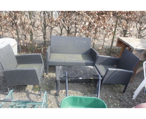 A small garden set comprising settee, two chairs and a coffee table