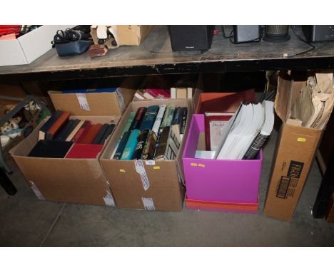 Seven boxes containing various books, sheet music, games etc.
