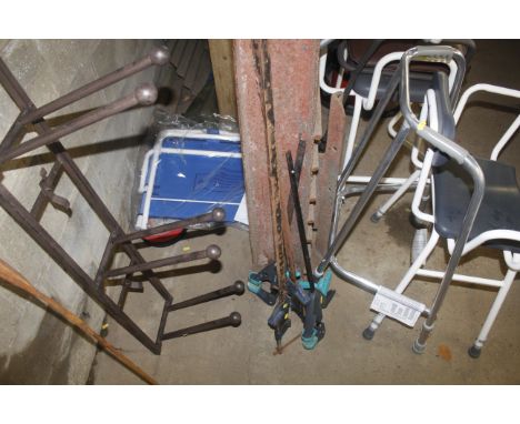 A pair of quick release clamps and a pair of metal sash clamps 