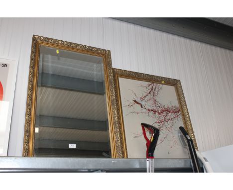 A gilt framed and bevel edged wall mirror and a gilt framed oil study of birds