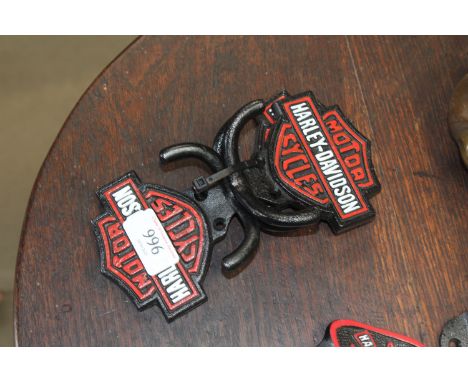 Three reproduction Harley Davidson coat hooks (79)