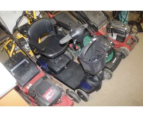 A small mobility scooter with keys and charger (working )   