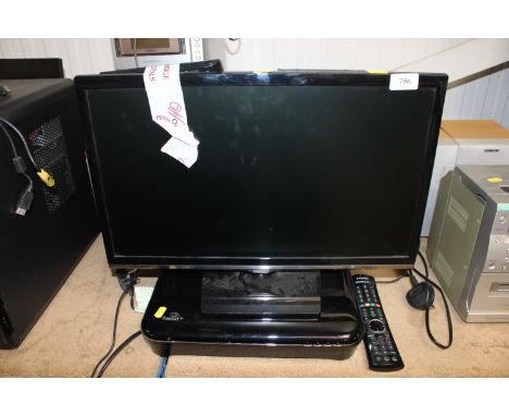 A Samsung 22" flat screen television with remote control and a Freesat box 