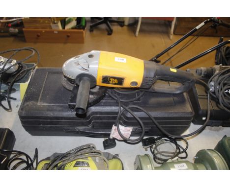 A large JCB angle grinder with case