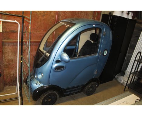 A Ruidi Cabin Scooter X9 mobility scooter. Registration Q859 KFE (no paperwork). With battery charger and keys, some damage t