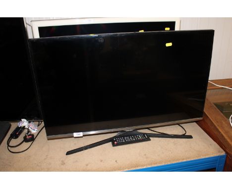 A Samsung 32" flat screen television with remote control 
