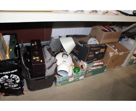 Six boxes containing various VHS tapes, sundry items, briefcase etc.
