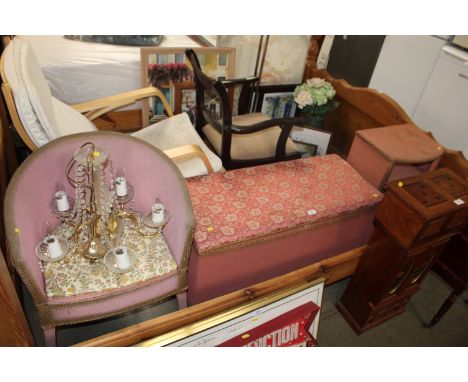 A loom and upholstered ottoman; a loom bedside cabinet; a loom armchair and a glass chandelier 