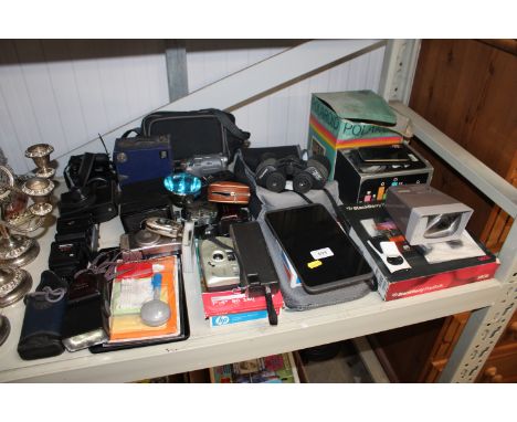 A collection of various cameras, tablets, phones etc. to include Apple, Kodak and a pair of binoculars - all sold as seen