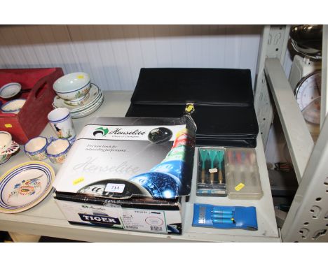 A set of Henselite bowls, darts and a briefcase 