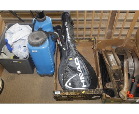 A box containing tennis and squash racquets