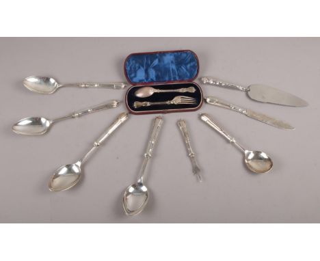 A cased Victorian silver fork and spoon, along with a collection of silver handled cutlery.  
