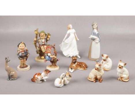 A collection of ceramics, Royal Doulton Friendship figure, Three Goebel figures examples  
