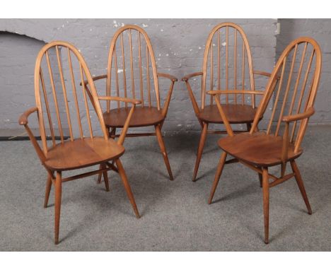A set of 4 light oak Ercol dining chairs.  