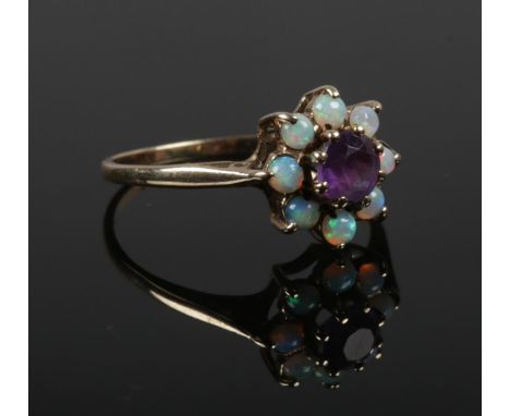 A 9ct gold opal and amethyst cluster ring, Size M 1/2. (1.66g).  