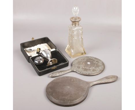 A silver dressing table mirror, a white metal example and a silver babies rattle head, Along with A silver collard glass perf