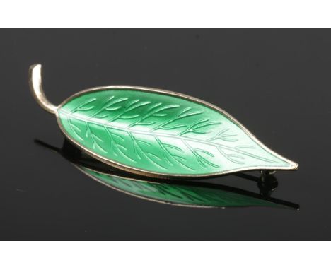 A Norwegian silver leaf brooch in the style of David Andersen. Decorated with green basse taille enamel, stamped Meka Sterlin