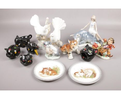 A collection of ceramics, to include Nao, Royal Doulton, USSR tiger etc.  