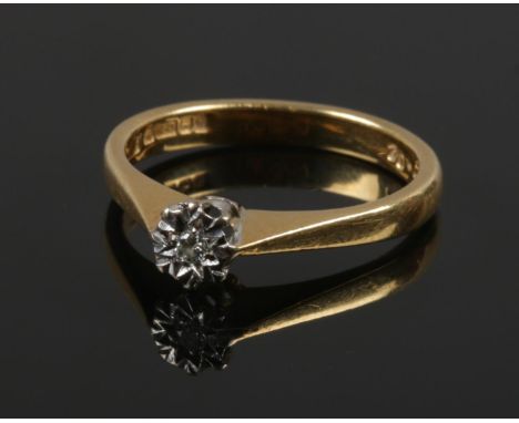 A vintage 18ct gold diamond solitaire ring. Size 0.2ct marked to the shank, Birmingham 1982, 3.1 grams, size K 1/2.  