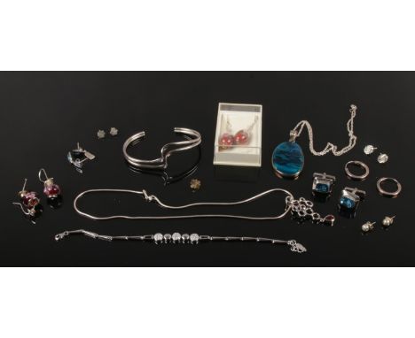 A collection of silver jewellery etc. Including bracelet, bangle and earrings in Pandora style, pava shell pendant and blue s