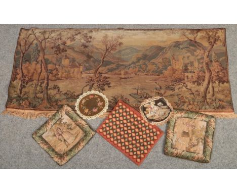 A collection of machine and hand woven tapestries. Including two lace edged antique examples and a wall hanging tapestry depi