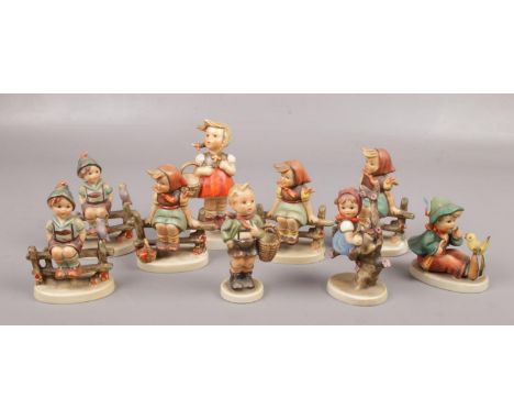 A collection of nine Goebel Hummel figures.  