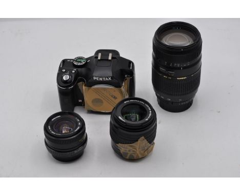 entax K-m camera with 3 lenses, including Miranda MC 24mm lens, Tamron AF 70-300mm lens, Pentax 18-55mm lens