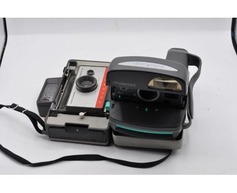 Two Polaroid cameras