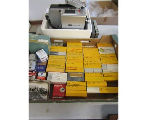 A collection of various slides- countries, rallys, festivals etc, many local, few holidays, along with a projector, few acces