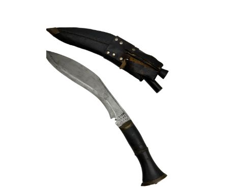 British Service issued Kukri, circa 1980s, with curving blade, hardwood and brass grip in leather covered scabbard with two s