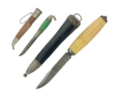 Two Scandinavian bowie knives, the first example with polished green handle with horse head final in white metal, with brown 