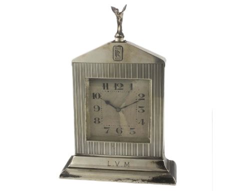 A RARE SOLID SILVER 8 DAYS DESK CLOCK IN THE FORM OF A ROLLS ROYCE RADIATOR GRILL CIRCA 1933, BLACK ENAMEL INLAID ROLLS ROYCE