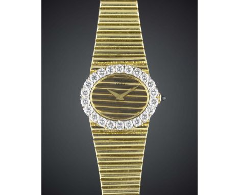 A FINE LADIES 18K SOLID GOLD & DIAMOND CHOPARD BRACELET WATCHCIRCA 1980s, REF. 5052 1 Movement: Manual wind, signed Chopard.C
